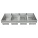 A Chicago Metallic metal rectangular bread loaf pan with four compartments.