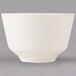 A white Homer Laughlin China bouillon bowl with a white rim on a white surface.