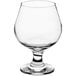 An Acopa brandy snifter with a small base.