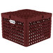 A burgundy plastic Vollrath Plate Crate with compartments for 12 plates.
