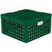 A green plastic Vollrath Traex plate rack with 30 compartments.