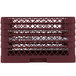 A burgundy Vollrath Traex plate rack with 21 compartments.