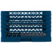 A blue plastic Vollrath Traex plate rack with 15 compartments.