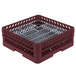 A burgundy plastic Vollrath Plate Crate with white metal dividers.