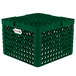 A green plastic crate with 12 plate compartments and holes.