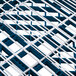 A close-up of a blue and white grid with white lines.