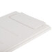 A white plastic rectangular object with a lid on top.