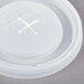 A white plastic lid for a Dinex Fenwick tumbler with a straw slot and a cross.