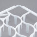 A white plastic Vollrath glass rack trim divider with holes.