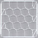 A white plastic grid with a pattern.