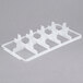 A white plastic Vollrath glass rack divider with 10 compartments.