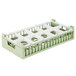 A white and green plastic Vollrath glass rack divider with four compartments.