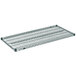A Metro Super Erecta wire shelf with smoked glass on top.