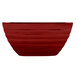 A red Vollrath double wall metal serving bowl.