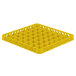 A Vollrath yellow plastic tray with many holes.