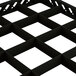 A black plastic grid with squares and holes.
