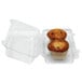 A clear plastic InnoPak container holding two muffins.