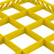 A yellow plastic grid with 16 square compartments.