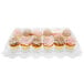 A clear InnoPak plastic container holding cupcakes.