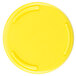 A close up of a yellow lid with a circular opening.