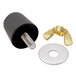 A black rubber cylinder with a black and silver metal nut and bolt, and a gold nut.