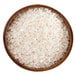 A bowl of Chikara medium grain white sushi rice.