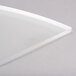 A close-up of an Eastern Tabletop tempered glass shelf with a white background.