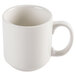 A close-up of a CAC Ivory china mug with a handle.