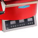 A red TurboChef electric countertop pizza oven with digital controls.
