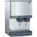 A white and silver Follett countertop ice maker and water dispenser.