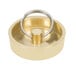 A round gold brass drain plug with a metal ring.