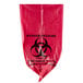 A red plastic High Density Isolation Infectious Waste Bag with a biohazard symbol.