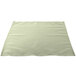 A seafoam green cloth napkin on a white surface.