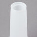 A white plastic cylinder with a white lid.
