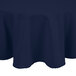 A navy blue round Intedge tablecloth on a table.