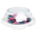 A clear plastic lid on a bowl of blueberries