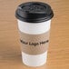 A coffee cup with a Natural Kraft paper sleeve on it.