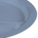 A close-up of a Cambro slate blue polycarbonate plate with 3 compartments.