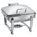 A stainless steel Eastern Tabletop chafing dish on a stand with a hinged dome cover.