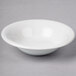 A white Fiesta china bowl on a white surface.