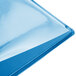 A Menu Solutions Hamilton Sky Blue menu board with a clear plastic cover.
