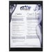A black Menu Solutions K22-Kent menu board on a stand.