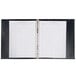 A black faux leather reservation binder with white pages.