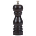 A black Chef Specialties pepper mill with a silver top.