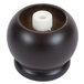 A black round object with a white cap, the Chef Specialties Duo pepper mill and salt shaker combo.