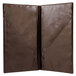 A brown leather Menu Solutions guest check presenter with two open pages.