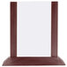 A Menu Solutions mahogany wood table tent with a white paper.