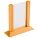 A wooden table tent frame with clear glass inserts.