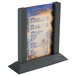 A black wooden Menu Solutions table tent with a menu on it.