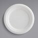 A white EcoChoice bagasse plate.